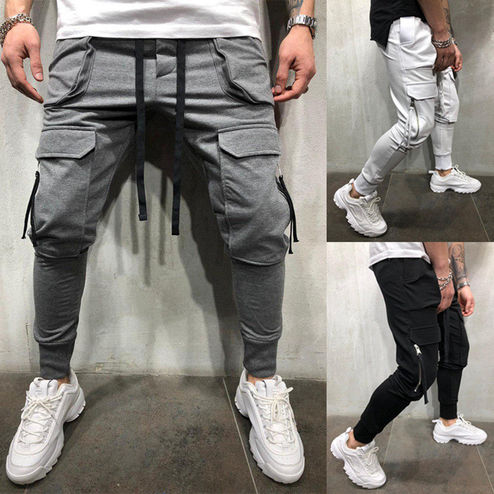 بنطال رياضي بقصّة Slim-fit مع جيوب بسحّاب