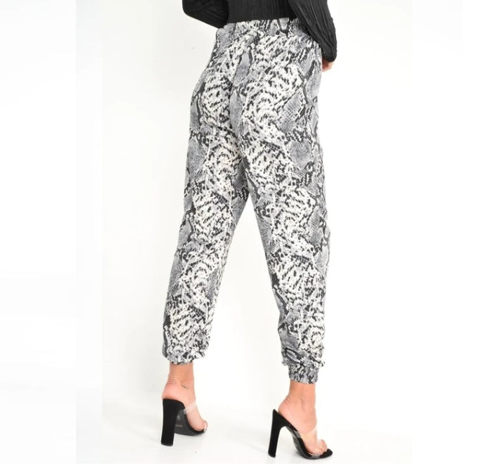 Hoge taille broek met slangenmotief