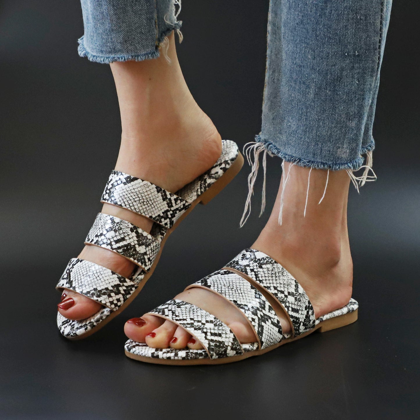 Flat snakeskin slippers