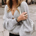 Knit sweater color V-neck buttons