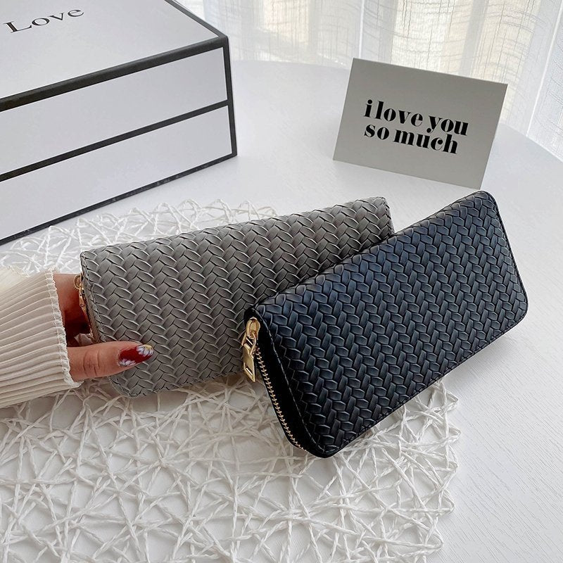 Zipped woven clutch