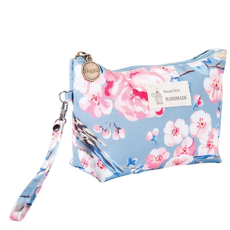 Monogram tarpaulin printed make-up bag